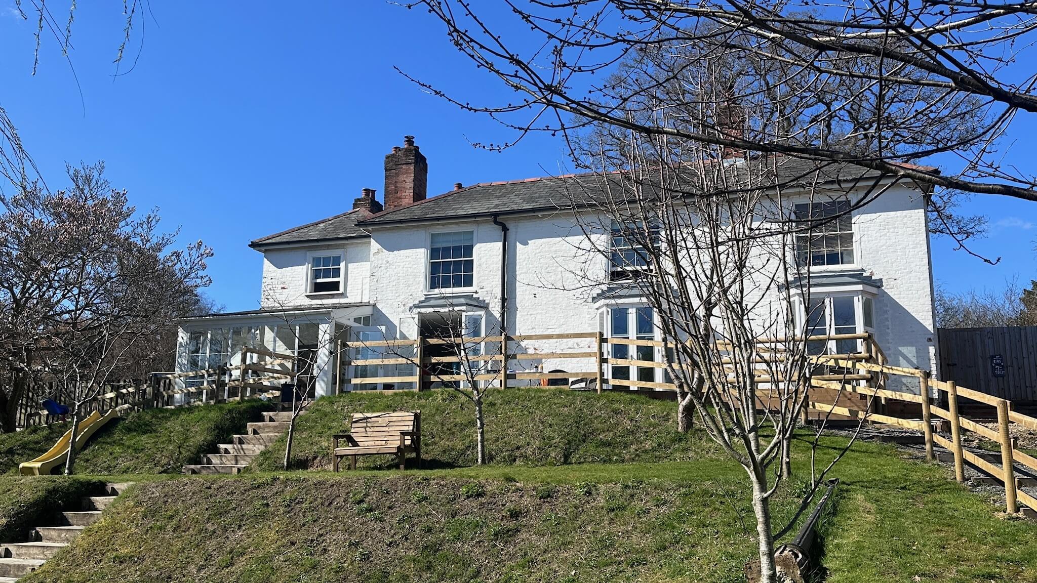 aldermoor farmhouse external shot looking up at the house
